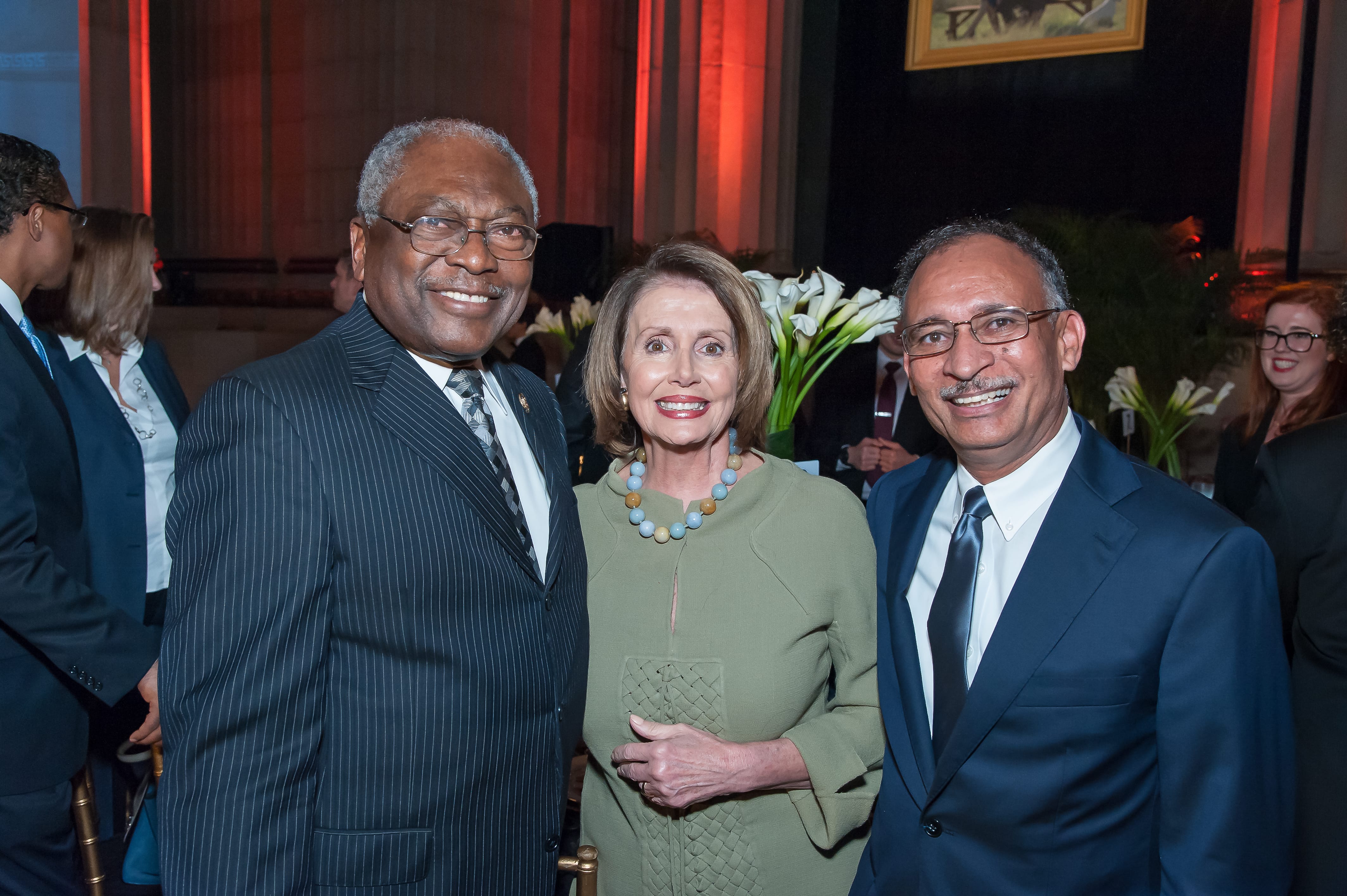 L-R: Congressman James Clyburn, Congresswoman Nancy Pelosi, and unknown. Photo by Tony Powell, 2015.