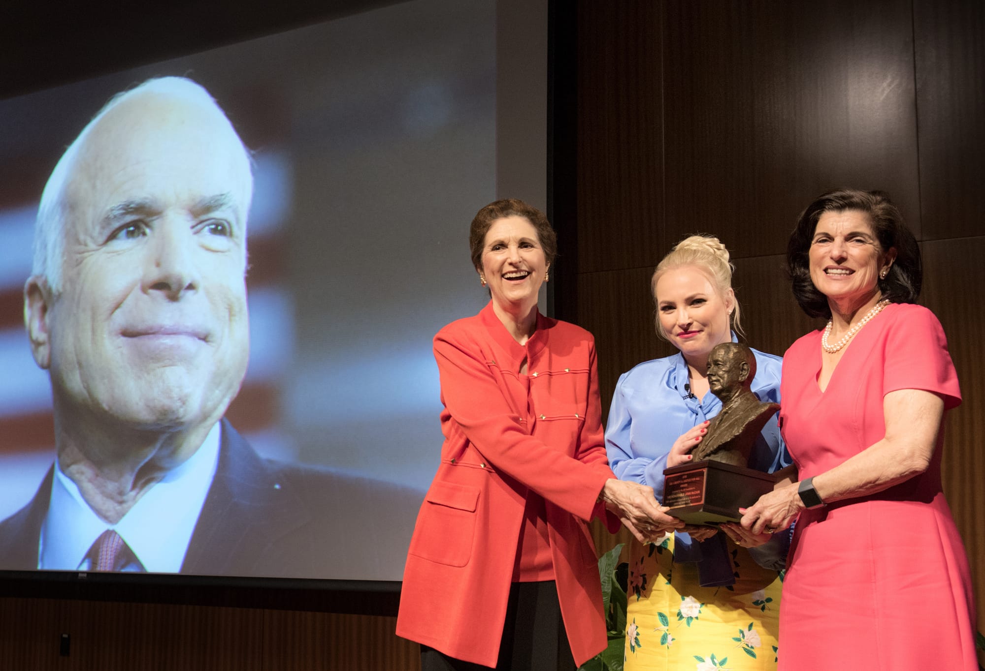 Accepting for her father, Senator John McCain, Meghan McCain receives the LBJ Liberty & Justice for All Award from President Lyndon B. Johnson's daughters, Luci Baines Johnson and Lynda Johnson Robb. LBJ Library photo by Jay Godwin.